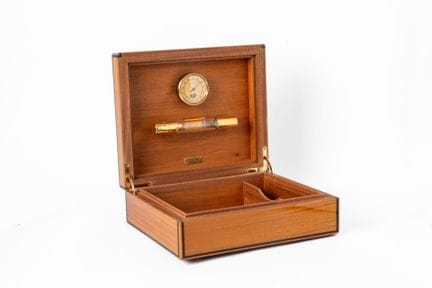 CHRISTIAN DIOR
Varnished lemonwood cigar box that 