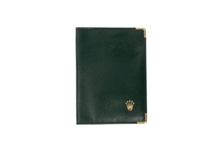 劳力士 型号 0068.08.05
绿色皮质卡包。内衬为皮革。
有使用痕迹。
尺寸：10.5 x 1
