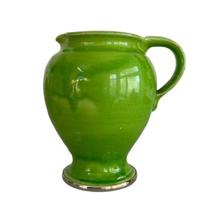 Brocca in ceramica con bordo in argento alla base,