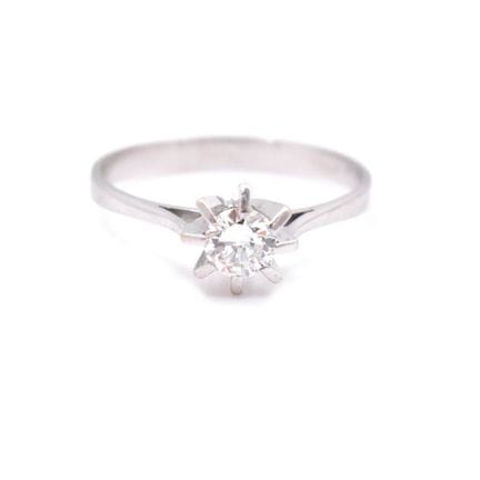 Ring Ringkopf besetzt mit einem Brillanten, ca. 0,