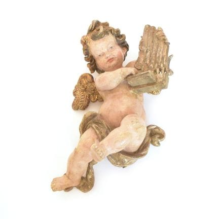 Geflügelter Putto mit Orgel Wohl Assistenzfigur de