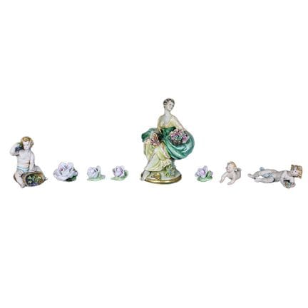 LOTTO COMPOSTO DA 1 scultura raffigurante fioraia,