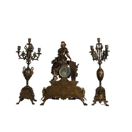 TRITTICO COMPOSTO DA  orologio raffigurante vendem