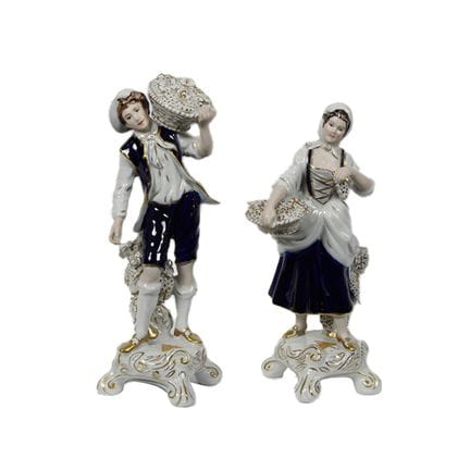 COPPIA DI SCULTURE  in porcellana raffigurante gio