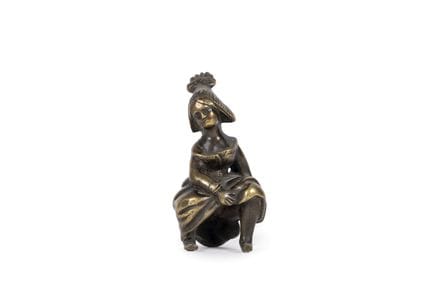 Erotic female figure made of lightly gilded bronze
