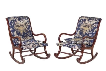 Pair of Louis Philippe rocking chairs in carved an