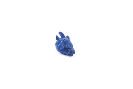 Bead in the shape of a caprid head made of lapis l