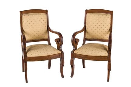 Pair of Louis Philippe armchairs in carved mahogan