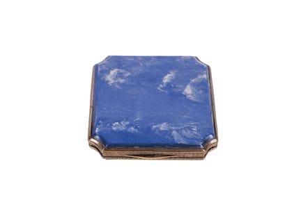 Delicate powder compact in gold-plated metal and r