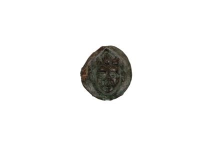 Bronze applique in the form of a male mask. Rome, 