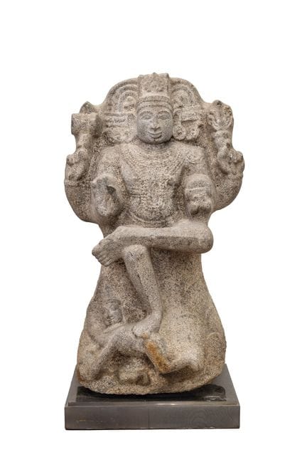 Shiva as Dakshinamurti, carved and polished granit