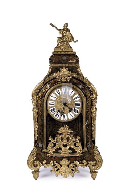 Louis XIV Boulle-style mantel clock. Made of wood 