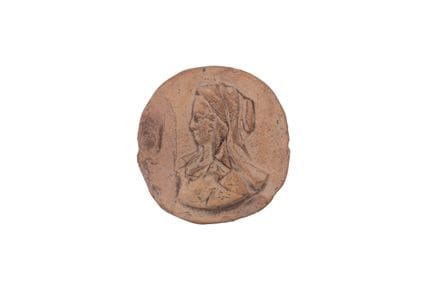 Medallion made of terracotta. Antique. 6.5 cm Ø. O