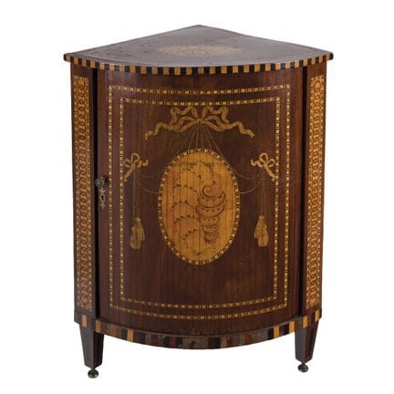 Dutch drum-shaped corner cabinet in carved and ven