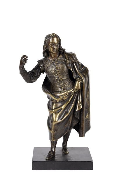 Figure made of lightly gilded bronze. On a base. 1