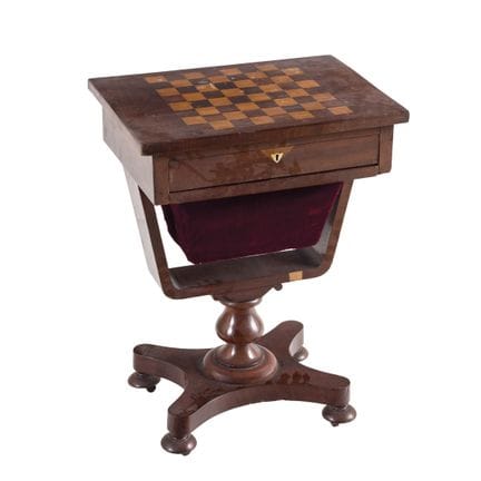 Edwardian game table made of mahogany. Top with ma