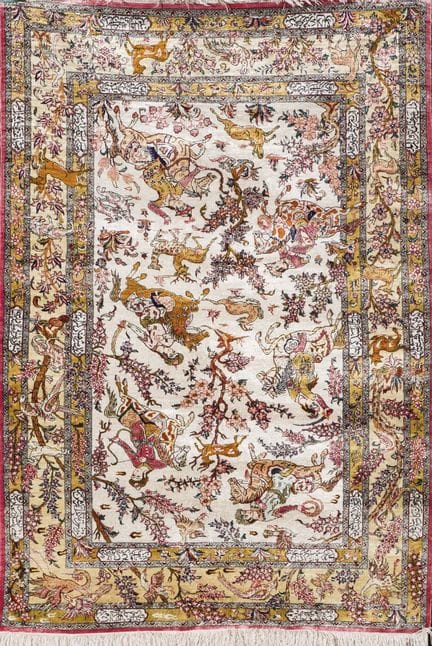 Persian silk rug. Decorated with flora, plants, an
