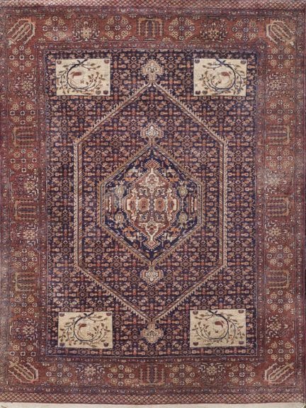 Persian rug in wool and silk. Geometric and floral