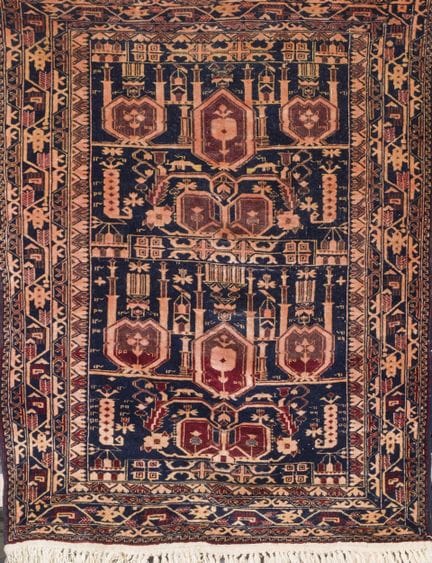 Oriental rug from the Caucasus made of wool. Geome