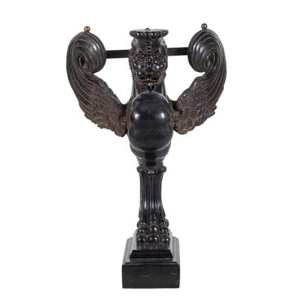 Foot made of patinated resin in the Empire style. 