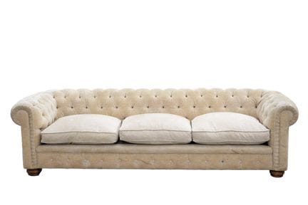 Large Chesterfield sofa upholstered in ecru. 20th 
