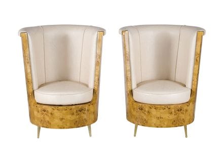 Pair of substantial Art Deco armchairs in carved a