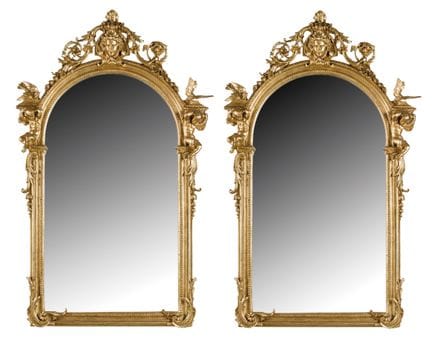 Pair of monumental historicist mirrors, somewhat r