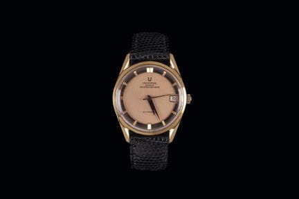 Herrenarmbanduhr der Marke UNIVERSAL, aus 18 Karat