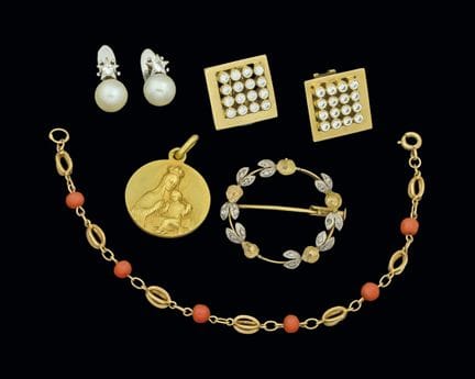 Assorted jewelry pieces, mostly 18K gold, featurin