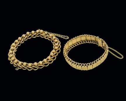 Set of two 18K yellow gold bracelets with ball-sha