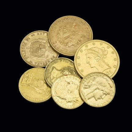 Set of seven gold coins of various denominations: 