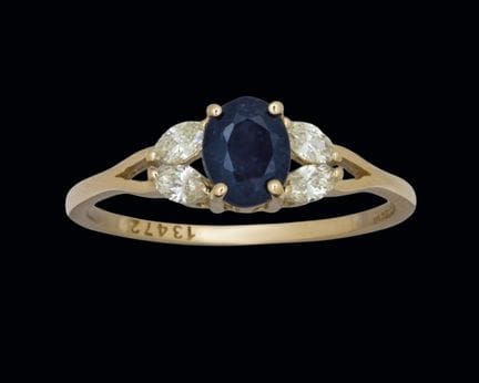Ring aus 14-karätigem Gelbgold mit einem blauen Sa