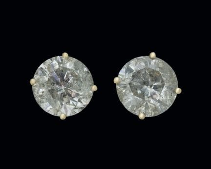 14K yellow gold earrings with claw-set diamonds we