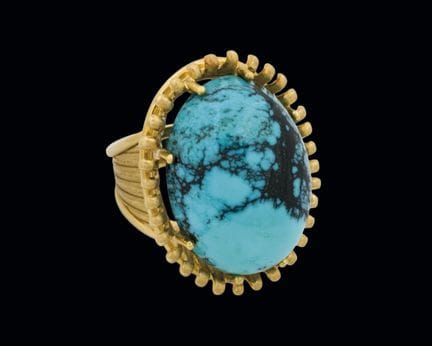 Large 18K yellow gold ring with a turquoise caboch