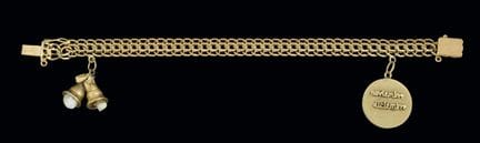 18K yellow gold bracelet with various charms: meda