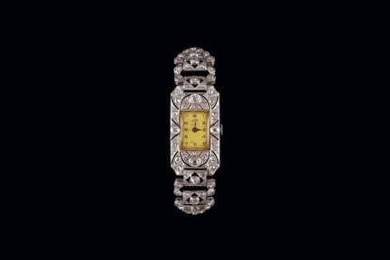 TISSOT-Damenarmbanduhr aus Platin mit Diamanten. M