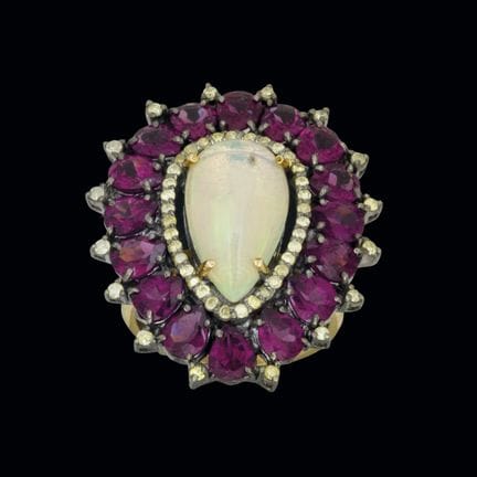 Ring aus Silber und vergoldetem Silber mit einem E