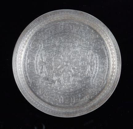 SAUCER
With oriental design
Made of foreign silver