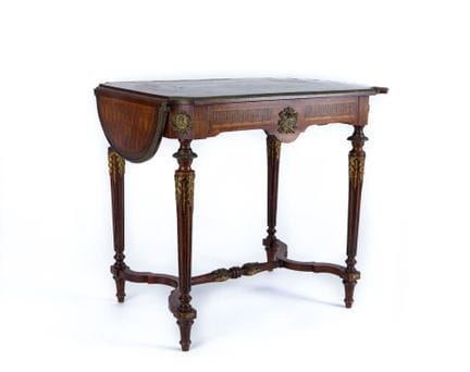 FOLDING TABLE
A: Decorated with musical motifs, ta