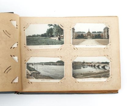 1900 PHOTO ALBUM
A collection of approximately 150