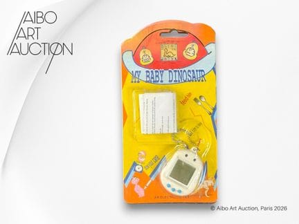 Juego electrónico tipo Tamagotchi.
Juego electróni