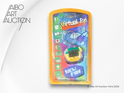 Juego electrónico tipo Tamagotchi.
Juego electróni