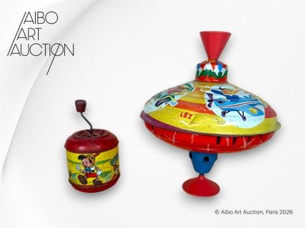 Set di 2 giocattoli:
- Trottola meccanica musicale