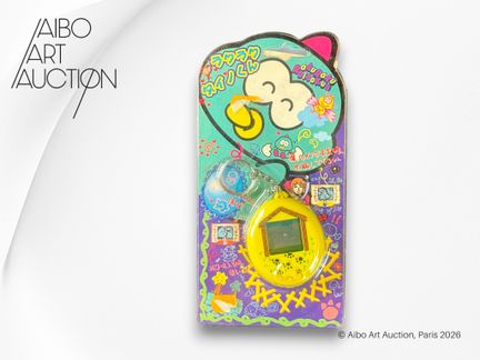 Juego electrónico tipo Tamagotchi.
RakuRaku DinoKu