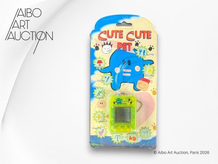 Juego electrónico tipo Tamagotchi.
Juego electróni