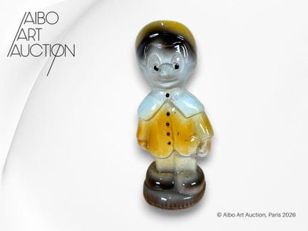Statuetta-salvadanaio raffigurante Pinocchio, con 