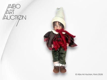 Bambola che raffigura Pinocchio, in abito invernal