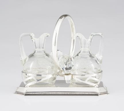 A Portuguese silver cruet stand
Silver structure, 