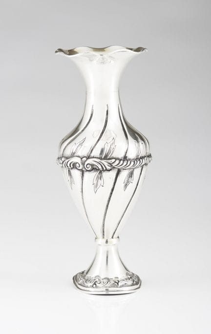 A Portuguese silver spiral vase
Silver, fineness .