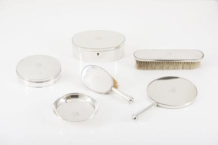 A Portuguese silver dressing table set
Comprising: